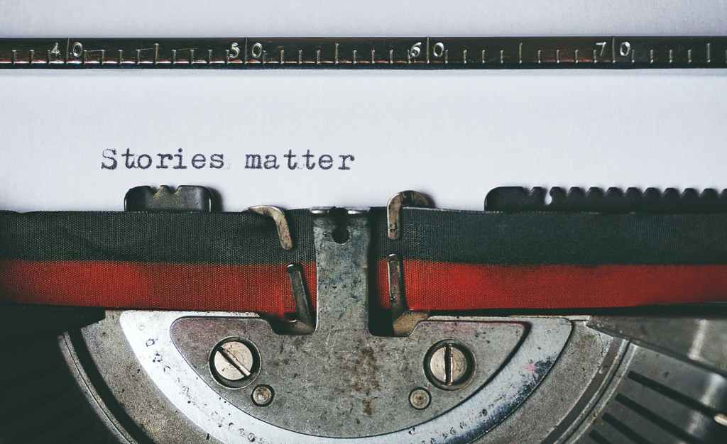 typewriter closeup with page that says stories matter